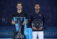 Andy Murray (L) & Novak Djokovic with their trophies at the 2016 ATP Finals